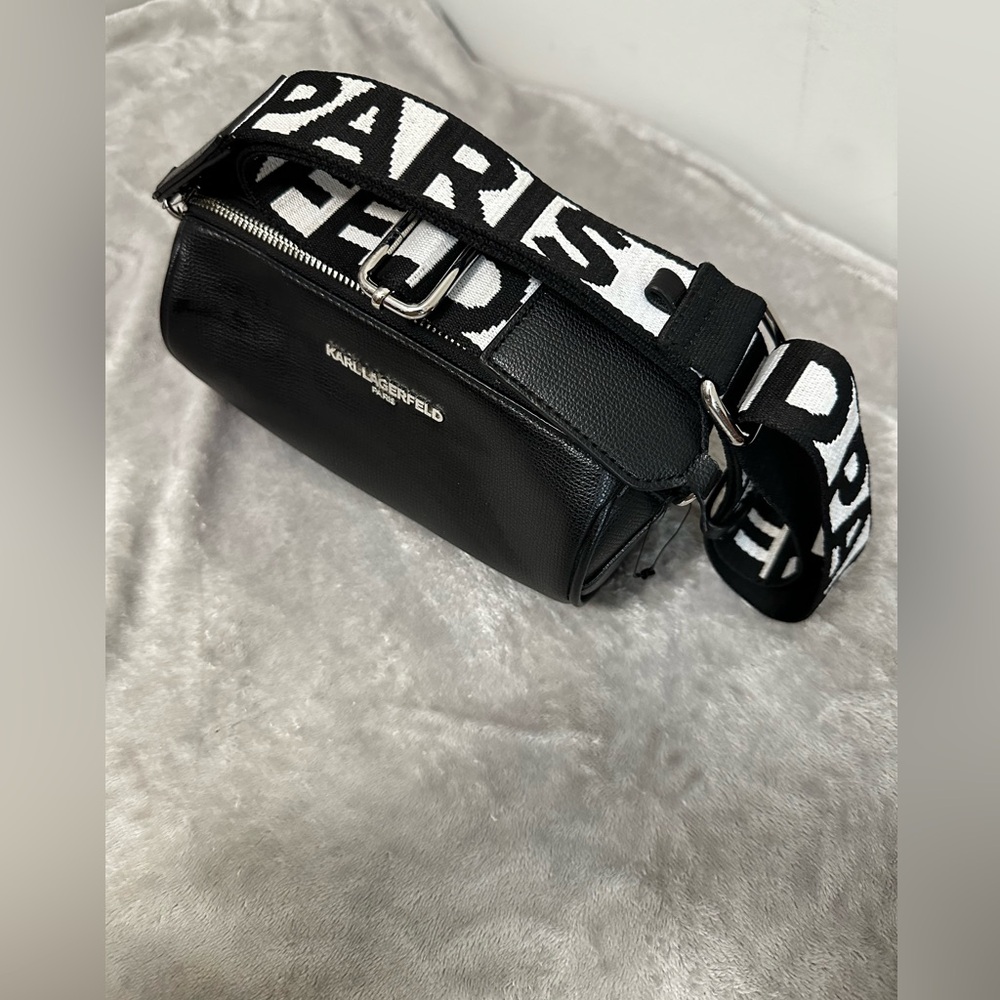 Karl Lagerfeld Paris Black Pebbled Barrel Crossbody Bag with Logo Guitar Strap - Picture 3 of 13